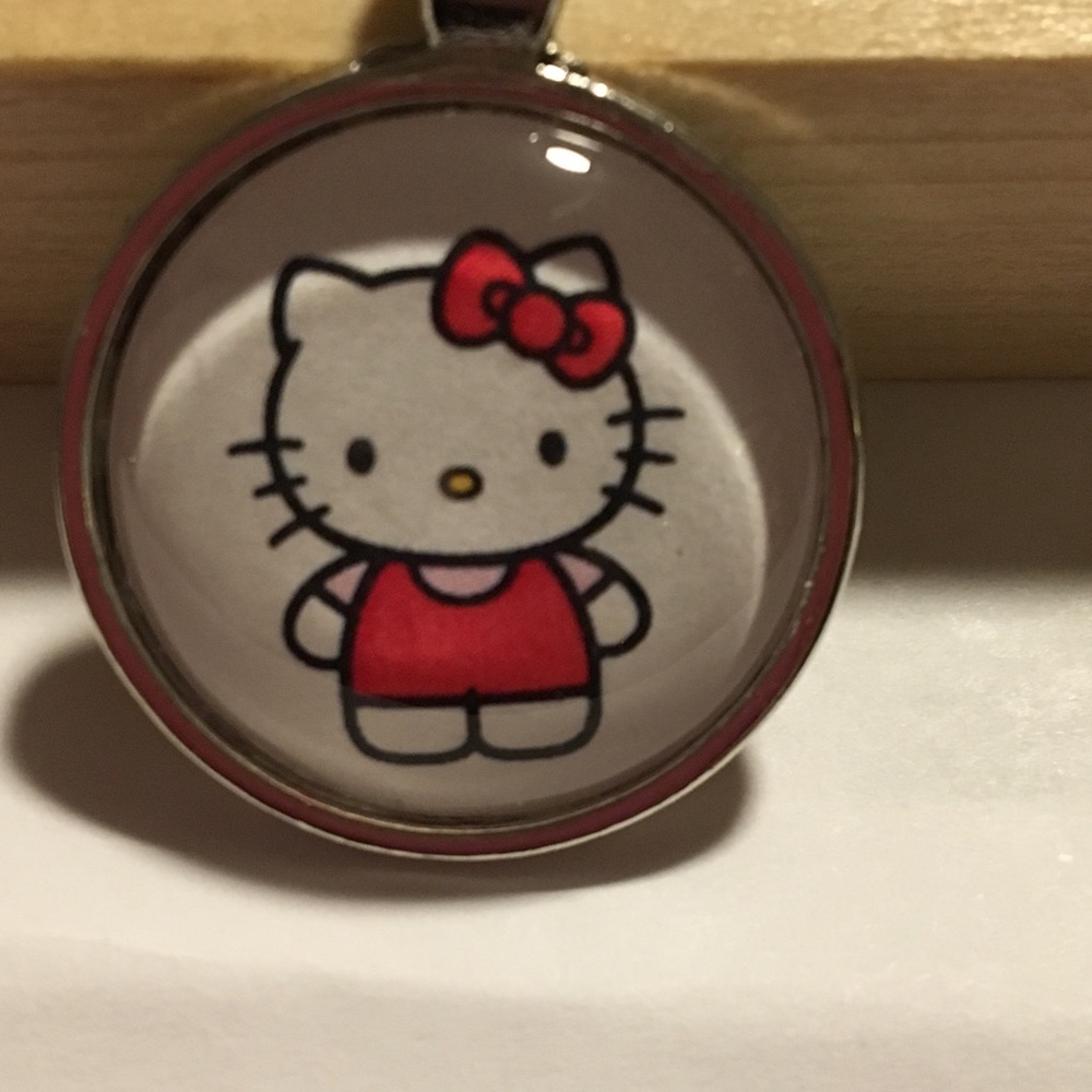 Hello kitty necklace or keychain